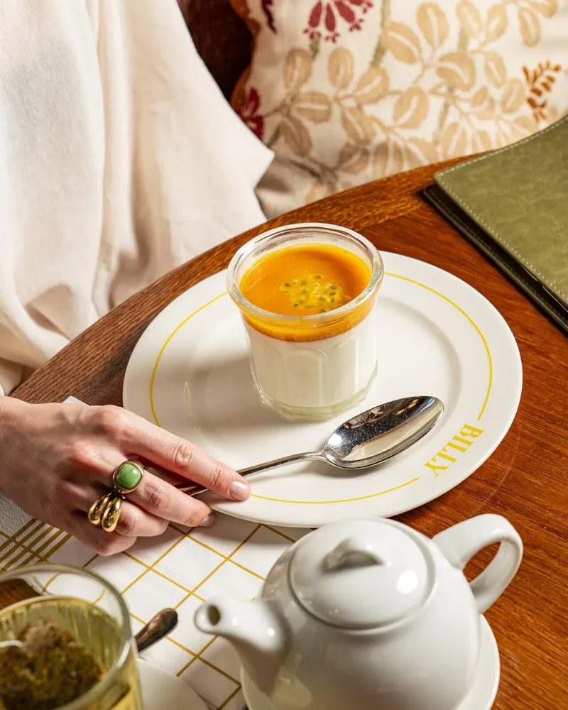 A dessert and a cup of coffee on the table